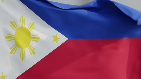 Philippines Flag Waving in the Wind Against a Grey Studio Background Vidéo 331109858