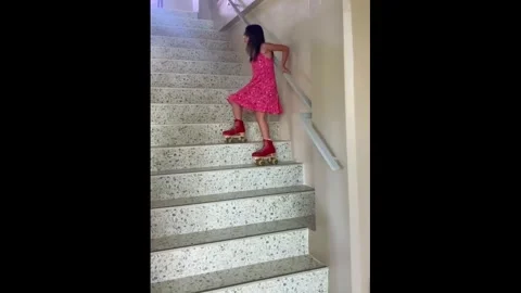 Philippines: Girl slips while skating after going down stairs in Lucban, ... Stock Footage 337644812