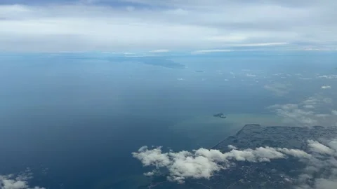 Philippines island view from above Pacific Ocean aerial plane window view travel Stock Footage 340596076