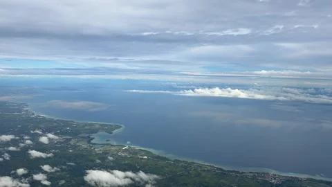 Philippines island view from above Pacific Ocean aerial plane window view travel Stock Footage 340596092