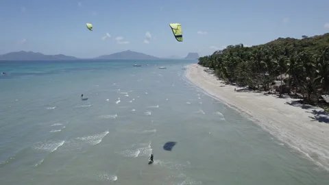 Philippines, Palawan, June 20 2024 Parasailing on the White Beach Stockbeeldmateriaal 280495960