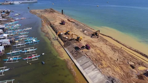 Philippines, Puerto Princesa 28 May, 2026 Excavators on Port Reclamation Video stock 336124982