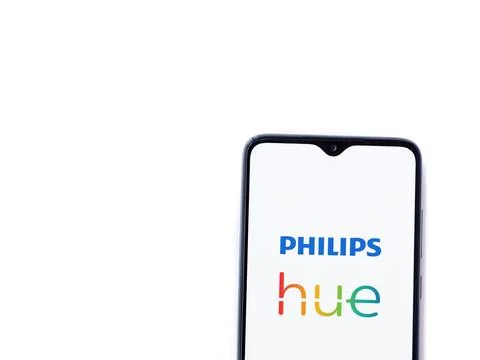 Philips Hue app launch screen on smartphone on white background Stock Photos