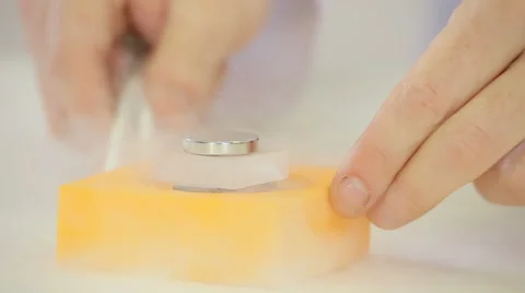Phisics in action, magnetic levitation experiment Stock Footage 64808771