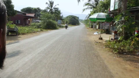 Phnom Penh, Cambodia – Dec 26, 2018: POV Motorcycle Ride Through City Stock-Footage 333705863