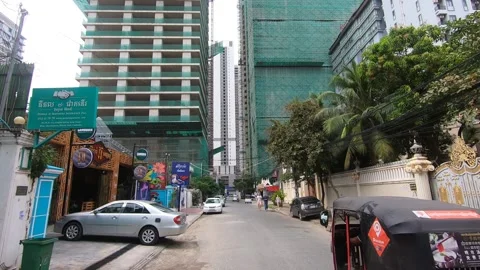 Phnom Penh Cambodia fast developing two tall skyscrapers under construction Video stock 231862584