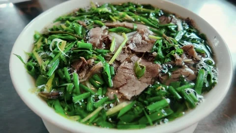 Pho Bo, traditional Vietnamese beef noodle soup Stock Footage 280243398
