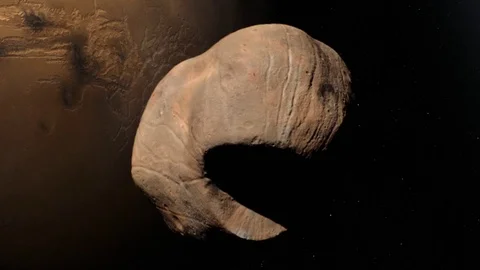 Phobos Orange  over Mars Stock Footage 73104527