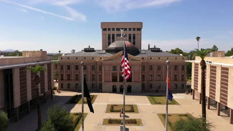 Phoenix Arizona State Capitol with flags in front, drone rise. Stock Footage 165085502