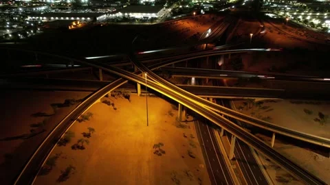 Phoenix Freeway Interchange at Night With Light Trails 스톡 동영상 347500094