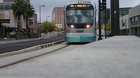 Phoenix light rail slowing for station on curved track Stock Footage 41590804