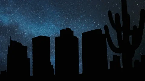 Phoenix: Time Lapse by Night with Skyscrapers, Saguaro Cactus, Stars and Milk Stock Footage 136427423