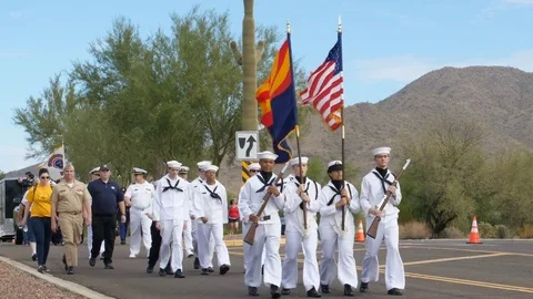 Phoenix, USA – 11/05/2017:  Veterans Day Parade Navy ROTC Marching Down Street Stock Footage