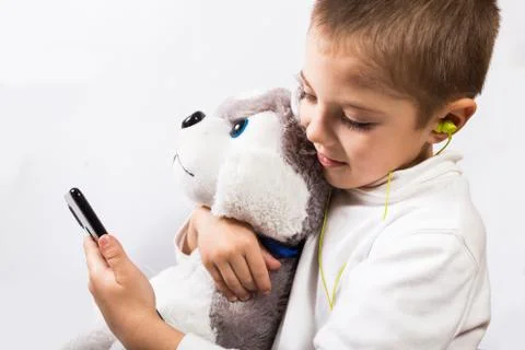 Phone addicted boy Stock Photos