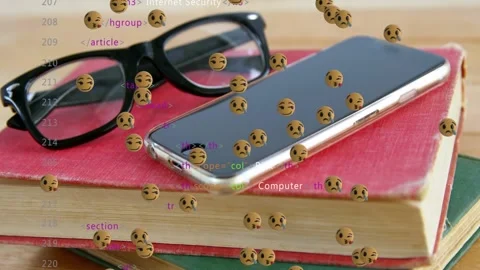 Phone and books receiving floating emoji swarm plus faint code after alert ping, Stock Footage 329700486