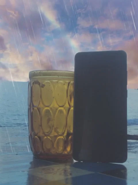 Phone and glass in moving cloud rain Stock Footage 220332157