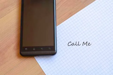 Phone and notepad Stock Photos