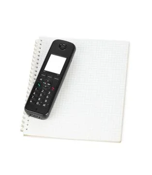 Phone and notepad Stock Photos