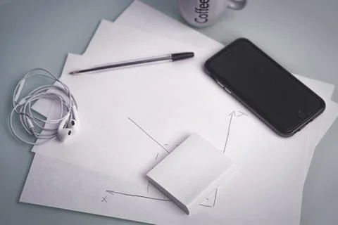 Phone and pen, a core set of hipster designer's workplace Stock Photos