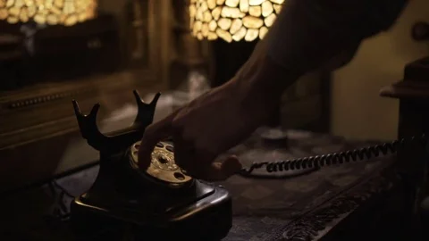 Phone answering and Using Vintage Rotary Dial Telephone. Antique room decor Stock Footage 73350149
