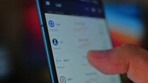 Phone on Bitcoin Crypto currency Gold Bitcoin BTC Bit Coin close up of Bitcoin Stock Footage 160164765