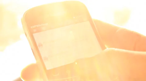 Phone BlackBerry with Sun Flare into cam GF Stock Footage
