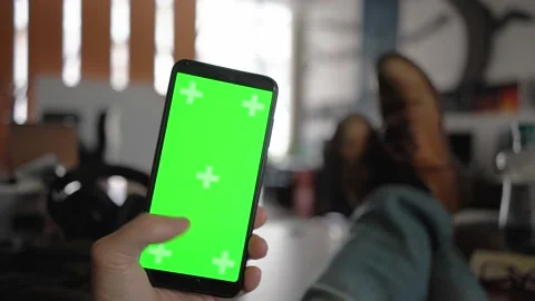 Phone with blank screen in hand Stock Footage 156078848