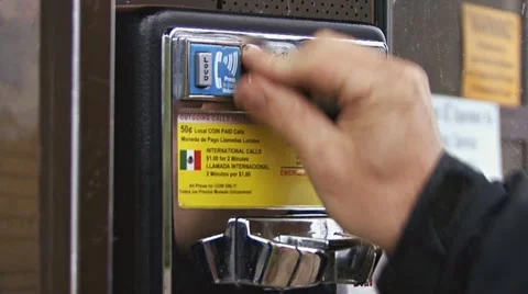 Phone Booth CU 1 - Inserting Quarters 스톡 동영상 11023111