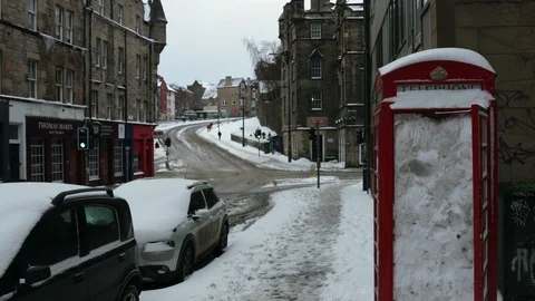 Phone booth full of snow Stock Footage 128276228