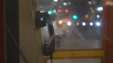 A phone in a booth at night. 動画素材 108124405