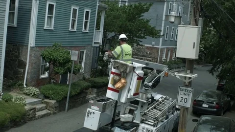 A Phone Cable Internet Utility Worker In A Bucket Lifted Up Lowering His Bucket  库存影片 76767652