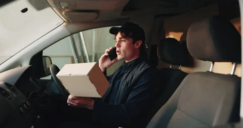 Phone call, boxes and delivery man in van for logistics or freight, distribution Stock Footage 341594133