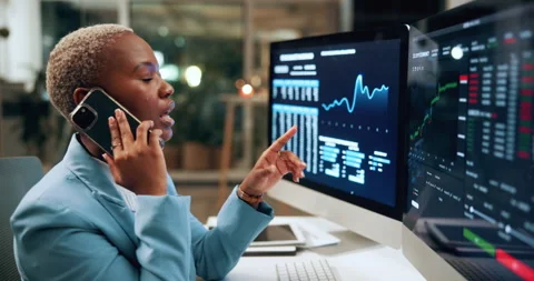 Phone call, computer screen and black woman in office at night with finance data Stock Footage 336310215