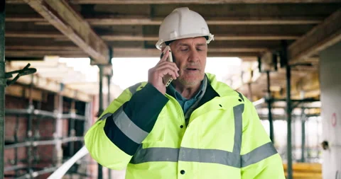 Phone call, engineer and mature man at construction site, walking or update for Stock Footage 337015756