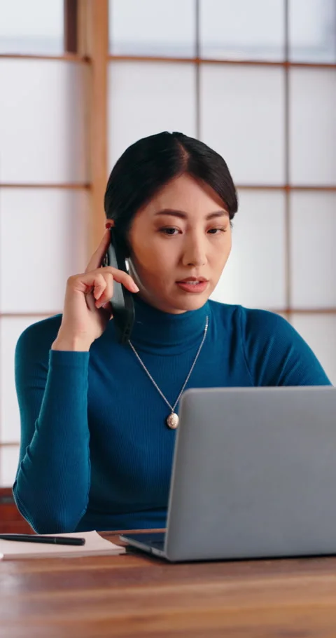 Phone call, talk and Asian woman with notes in home office, remote work and Stock Footage 341097129