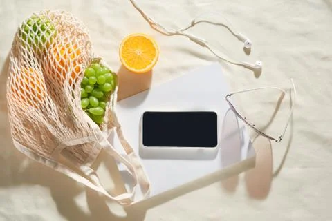Phone, camera, fruit, bag, notebook and accessories, top view, Flat lay, The  Stock Photos