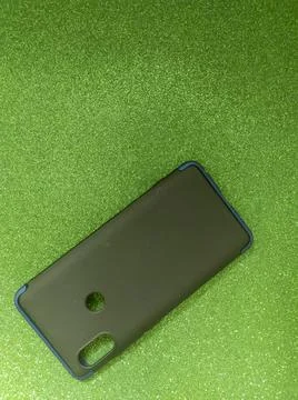 Phone Case on Green Sparkle Texture Stock Photos