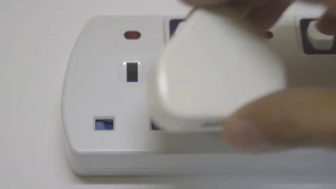 Phone charger plug into socket Stock Footage 123724953