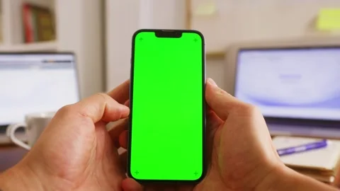 Phone with chroma key green screen man working with chatbot AI online Stock Footage 308536828