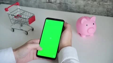 Phone with a chromakey screen in the hands of a close-up . top view smartphone Stock Footage 142059741