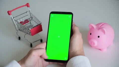 Phone with a chromakey screen in the hands of a close-up . top view smartphone Stock Footage 144802077