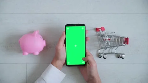 Phone with a chromakey screen in the hands of a close-up . top view smartphone Stock Footage 147245745