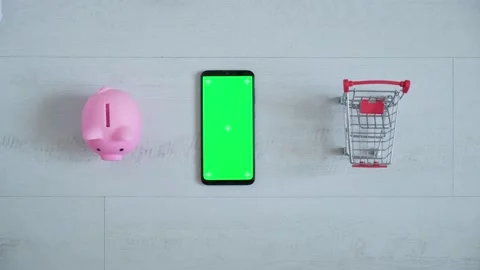 Phone with a chromakey screen in the hands of a close-up . top view smartphone Stock Footage 147385600