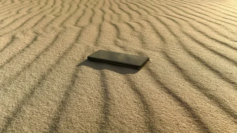 Phone in desert under the sun Stock Footage 200745845