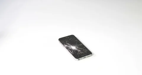 Phone falling hitting ground broken scre... | Stock Video | Pond5