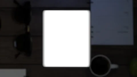 The phone falls on the table, the display turns on, which then turns into a g Stock-Footage 261159325