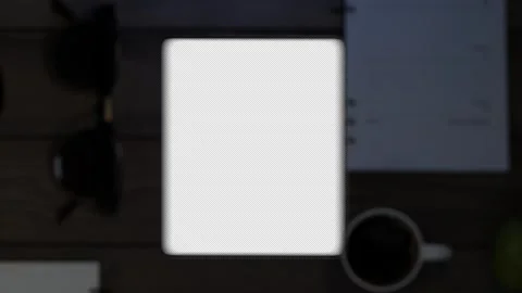 The phone falls on the table, the display turns on, which then turns into a g Stock Footage 261159623