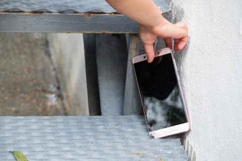 Phone fell on the steps Stock Photos