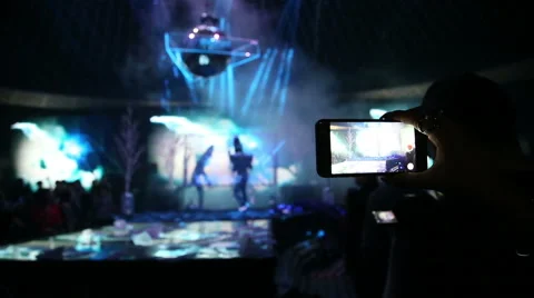 Phone filming a show Stock Footage 59574945