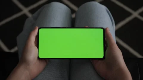Phone With Green Mock-up Screen Chroma Key Surfing Internet Watching Conten.. Video stock 314833301